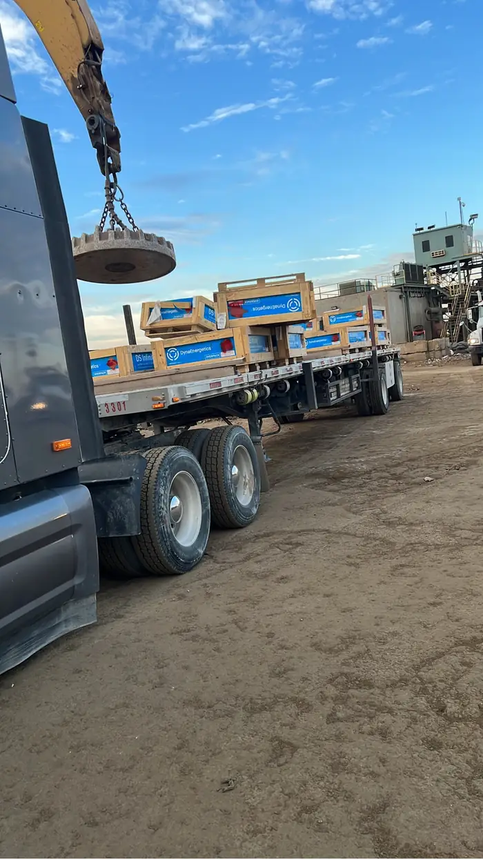 GTM Transport Peterbilt flatbed loaded with oilfield generator equipment